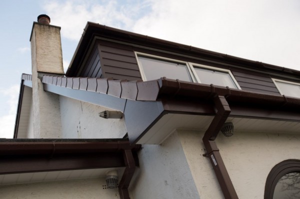 Rosewood fascias,white soffits,rosewood shiplap weather board ,brown dry verge & brown square ra